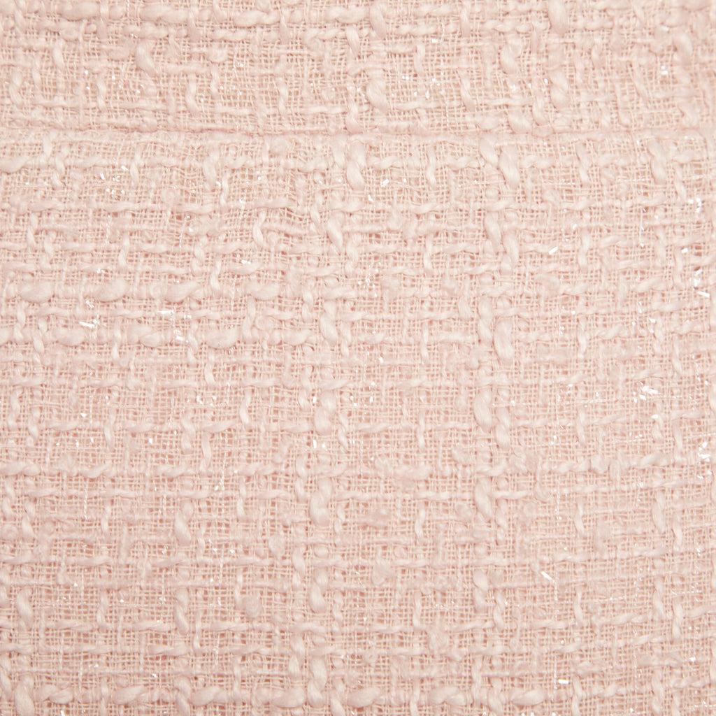 Jupe courte en tweed rose poudré