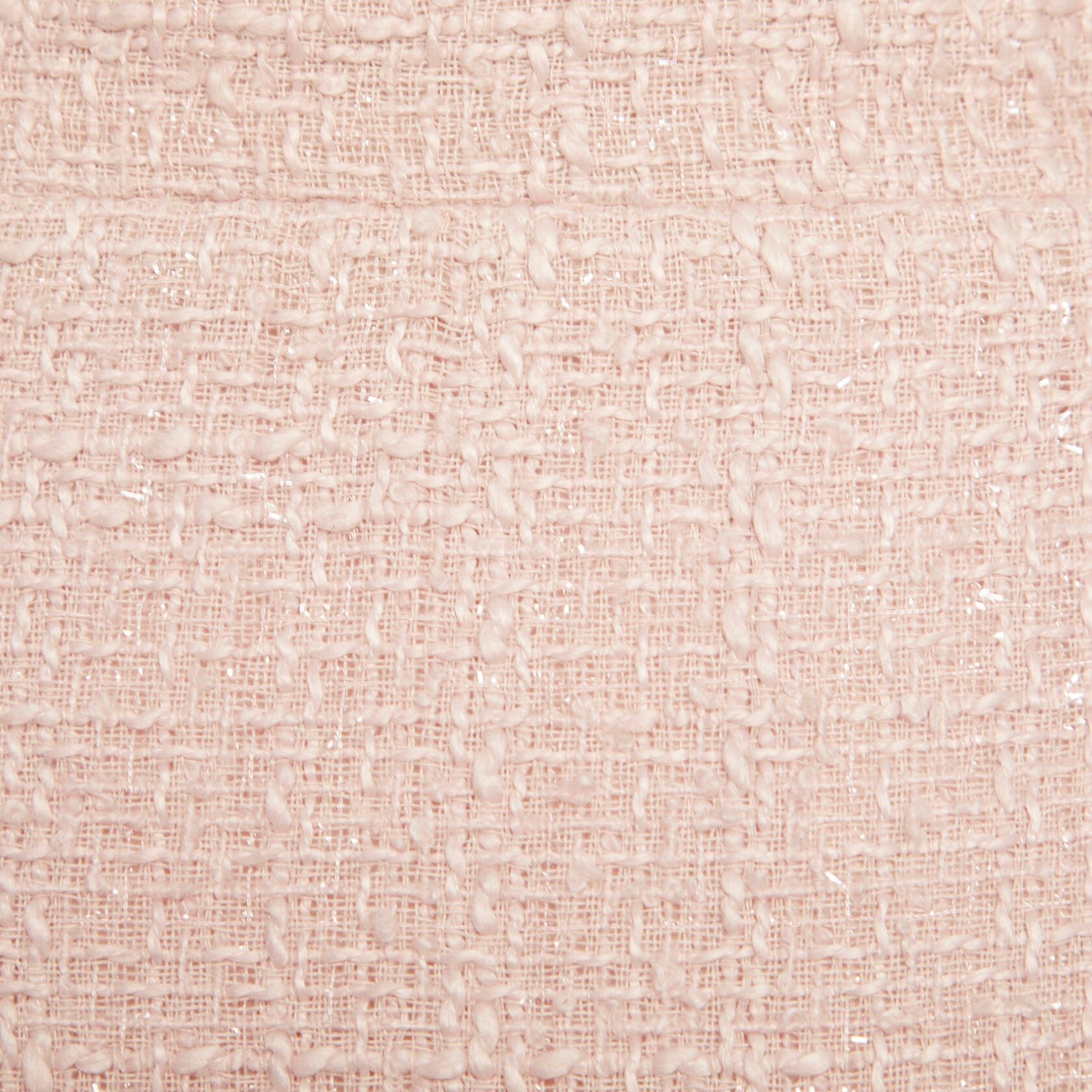 Jupe courte en tweed rose poudré